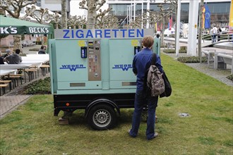 Germany, Hessen, Fankfurt, Mobile cigarette machine parked in the grounds of the Musik Messe trade show.