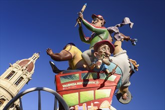 Spain, Valencia Province, Valencia, Las Fallas scene with Papier Mache figures on a Bus Turistic in