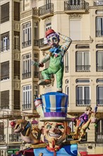Spain, Valencia Province, Valencia, Papier Mache figure in the street during Las Fallas festival.