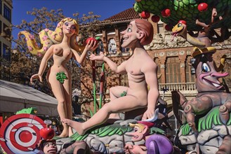 Spain, Valencia Province, Valencia, Papier Mache figures of Adam and Eve in the garden during Las