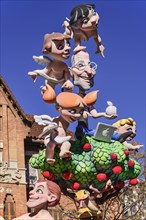 Spain, Valencia Province, Valencia, Papier Mache figures in the street during Las Fallas festival.