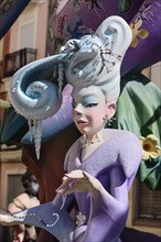 Spain, Valencia Province, Valencia, Papier Mache figure of well dressed lady in the street during