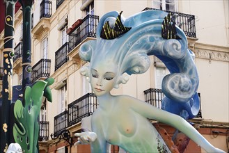 Spain, Valencia Province, Valencia, Papier Mache figure of mermaid in the street during Las Fallas
