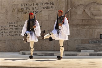 Greece, Attica, Athens, Greek soldiers, Evzones, marching beside Tomb of the Unknown Soldier,