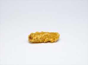 Food, Cooked, Meat, Single fried battered pork sausage on a white background.