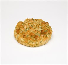 Food, Cooked, Bread, Whole loaf of cheese and herb tear and share bread on a white background.