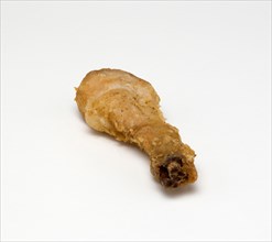 Food, Cooked, Poultry, single battered chicken drumsticks on a white background.