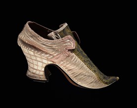 woman's shoe;satin with applied silk decoration; broad band woven in gold thread; British; 1700-1710.