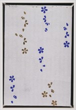 Papier-découpé représentant des fleurs écloses dans un étang