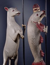 A statue of an heraldic salmon & a statue of an heraldic ram (2 of a set of 4); carved & painted oak;made for Thomas, Lord Dacre (1467 - 1525);English;1500 - 25.