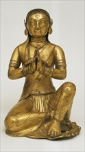 Statue népalaise représentant une femme