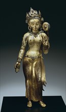 "Sculpture - Figure of  the Buddhist Goddess Sitara; painted and gilded copper with semi-precious stones, turqoise,imitation rubies and lapis lazuli; Nepalese; c.14th century."