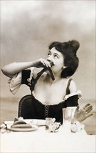 Woman peeling banana. Europe, 19th-20th century