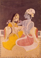 Radha assise près de Krishna