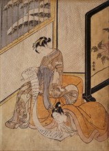 Haunobu, Courtesan and her lover reading a letter