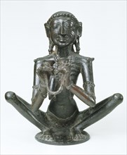 Statuette représentant un homme assis, Inde