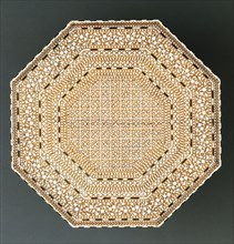 Small table, octagonal top with eight legs. India, 1881