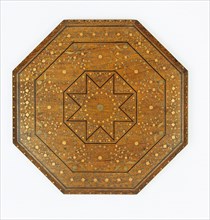 Small table, octagonal top with eight legs. India, early 20th century