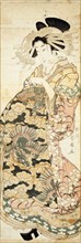 Courtesan Wearing Dragon Pattern Kimono, by Katsukawa Shunsen. Japan, 18th-19th century
