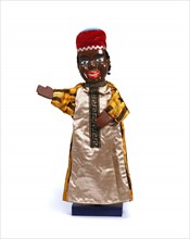 Glove puppet of a black man, by Fred Tickner. England, 20th century