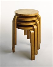 Stacking stools, by Alvar Aalto. Finland, early 20th century.