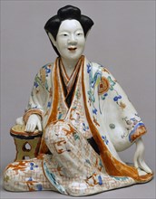 Figure of a Seated Courtesan. Arita, Japan, 19th century