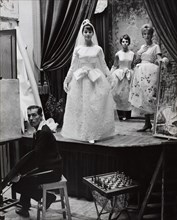 Model wearing a wedding dress on a stage, photo John French. UK, 1961. 
Londres, Victoria & Albert