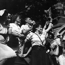 Scene of cheering crowd, during the Liberation of Paris (August 1944)