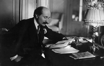 Edmond Rostand at his office