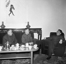 Pu Yi, with a member of his family, and Prime Minister Zhou En Lai, January 1960