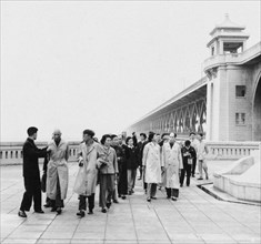 Pu Yi and his wife Li Shu Xian visit the First Chang Jiang Bridge of Wuhan, 1964