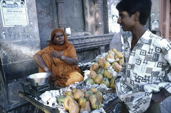 Vendeuse de mangues
Jaïpur, l'est du Rajasthan, Inde.