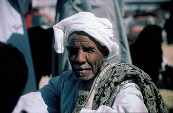Merchant in market near Luxor, Egypt