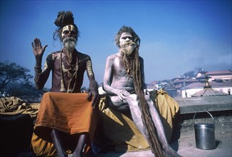 Sadhus near the cremation ghats on the Vishnumati River in the Khatmandu Valley, Nepal, India.