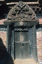 Porte d'entrée dans la cour de Mani Keshar Chowk, à Patan, vallée de Kathmandu, Népal