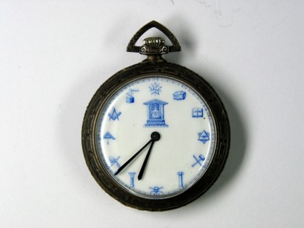 Pécou, Enamelled Comtoise clock face with Masonic motifs.