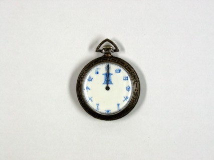 Pécou, Enamelled Comtoise clock face with Masonic motifs.