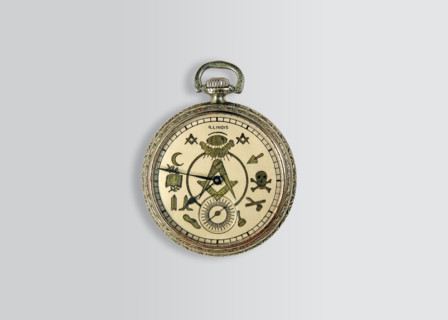 American pocket watch with hour symbols.