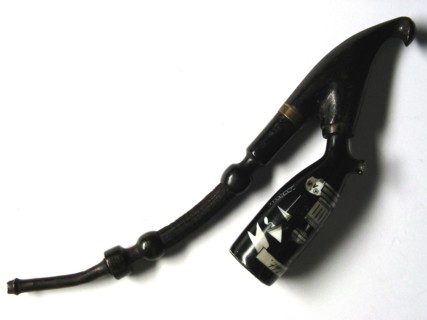 Porcelain pipe with Masonic motifs.