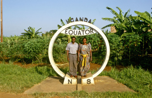 TWO LOCALS AT UGANDAN EQUATOR MONUMENT, UGANDA