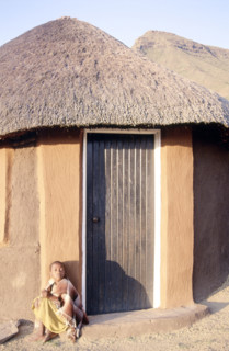 BASOTHO HUT AND A CHILD, LESOTHO