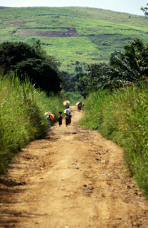 LOCALS WALKING DOWN DIRT ROAD, DEMOCRATIC REPUBLIC OF THE CONGO