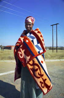 Young woman and baby on her back