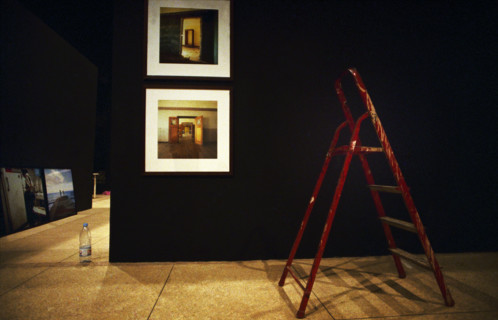 Setting up photographic exhibition at the National Museum before the launch of the 6th African