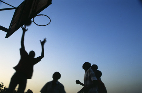 In the suburb of Corofina Nord, Bamako, Mali, young people gather in the late afternoon at a large
