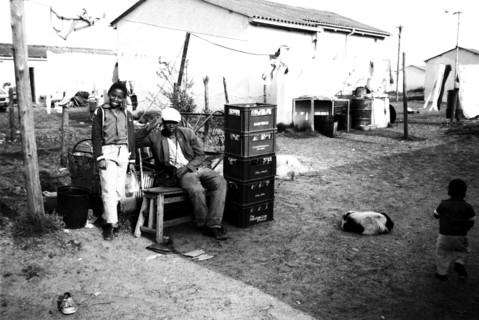 Langa, Cape Town, South Africa, 1989
young xhosa  boys, men,  black townships, dog, dogs,