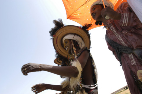 Wodaabe men perform a dance of male beauty at a festival in InGall, near Agadez in Niger on Friday