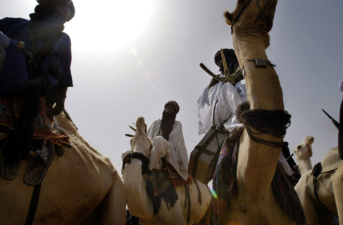 Nomads are seen on camels at the Salt Cure festival drawing nomads from all over the region to