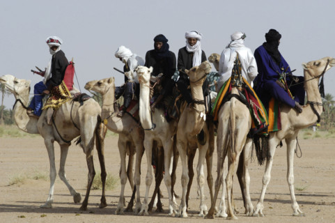 Nomads are seen on camels at the Salt Cure festival drawing nomads from all over the region to