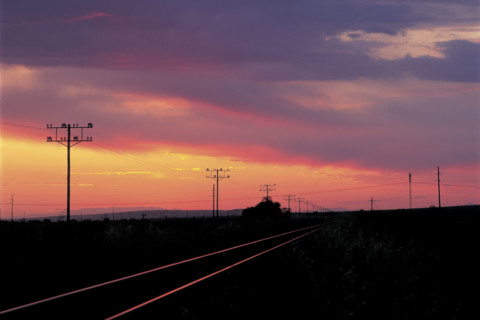 TRAIN TRACKS AT SUNSET